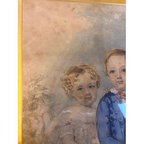 581 - A 19th century watercolour of three children in an ornate gilt frame - 80cm x 64cm