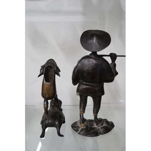  A Japanese bronze figure of Jiraiya, likely an incense burner, together with a bronze figure of a fi... 