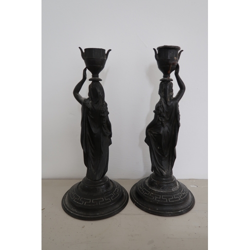  A pair of cast bronze candlesticks, of classical figurative form, each stamped to the base, Verlag B... 