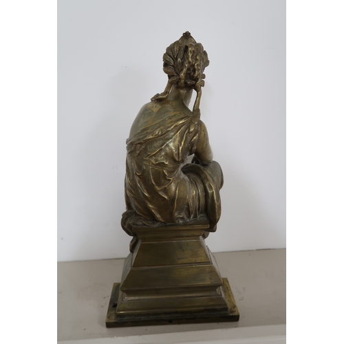  A gilt metal (possibly bronze) allegorical figure of History, modelled seated on a stepped base, hol... 