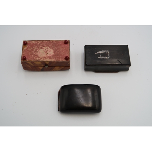  A group of three tortoishell snuff boxes, comprising a dark shell, curved example with hinged lid, c... 