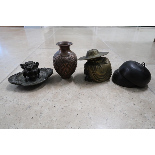  A group of Chinese metal wares, comprising a Buddha figure, curled into his sleeves, sleeping, with ... 