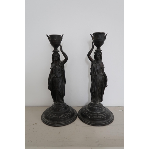  A pair of cast bronze candlesticks, of classical figurative form, each stamped to the base, Verlag B... 