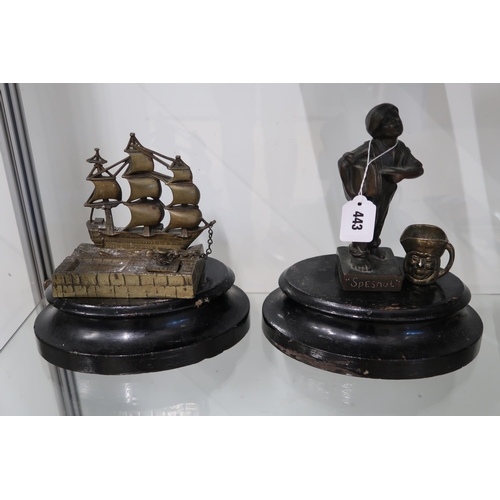  A group of bronze and brass wares comprising a cast bronze Qualcast advertising figure of a paper bo... 