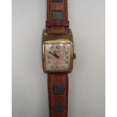 256 - A vintage Trafalgar, manual wind wristwatch, the signed rectangular dial with Arabic numerals and mi... 