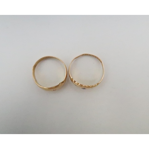 36 - Two 18ct gold rings. One set with a diamond chip, size P 1/2. One with a sapphire and one diamond ch... 