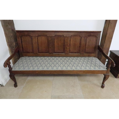 663 - A Georgian oak and mahogany crossbanded settle, 189cm wide