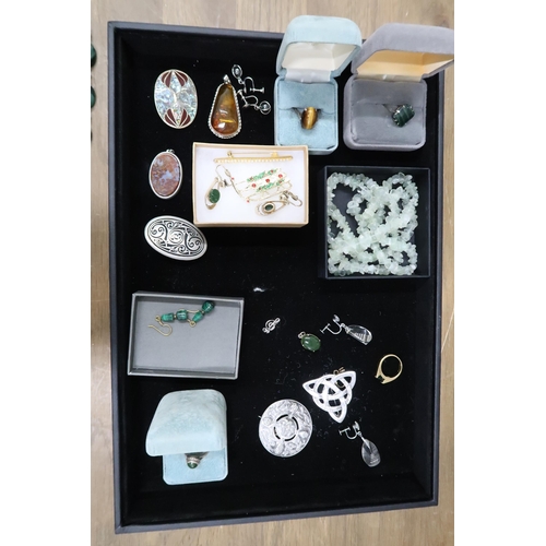 100 - A group of silver and costume jewellery including a Scottish silver Celtic Trinity knot brooch, anot... 