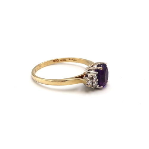 13 - An 18ct yellow gold amethyst and diamond ring, diamonds are well matched and bright and lively, head... 