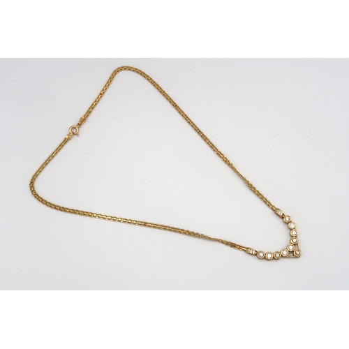 2 - A 14ct gold and diamond wishbone necklace, set with ten diamonds, each approximately 0.05ct, with fu... 