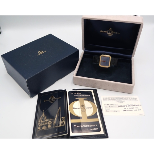 272 - A Baume & Mercier 18ct yellow gold wristwatch on black Baume & Mercier leather strap with sapphire s... 