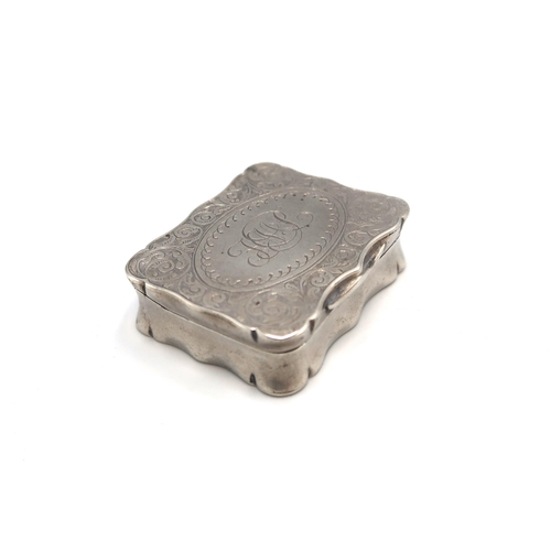 335 - A H.M. Silver and gilt lined pill box, Birmingham 1900, 1.59 Troy Oz monogrammed to top with foliate... 