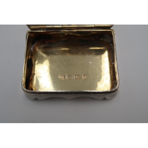 335 - A H.M. Silver and gilt lined pill box, Birmingham 1900, 1.59 Troy Oz monogrammed to top with foliate... 