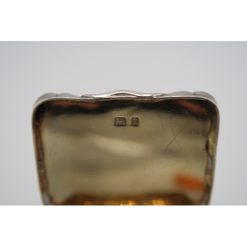 335 - A H.M. Silver and gilt lined pill box, Birmingham 1900, 1.59 Troy Oz monogrammed to top with foliate... 