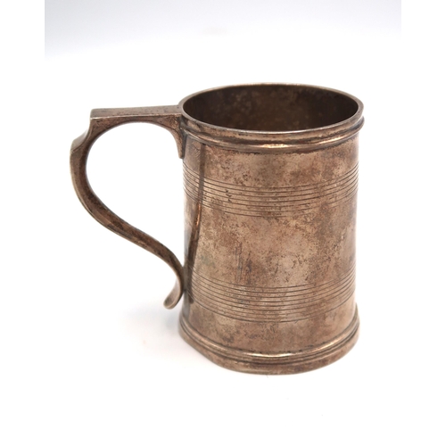 338 - A Silver H.M. Tankard London 1893, 4.2 Troy Oz. 8cm high with 3.5cm diameter.