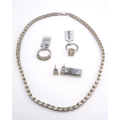 66 - A set of silver jewellery set with serenite. To include a single stone ring size L1/2, a five stone ... 