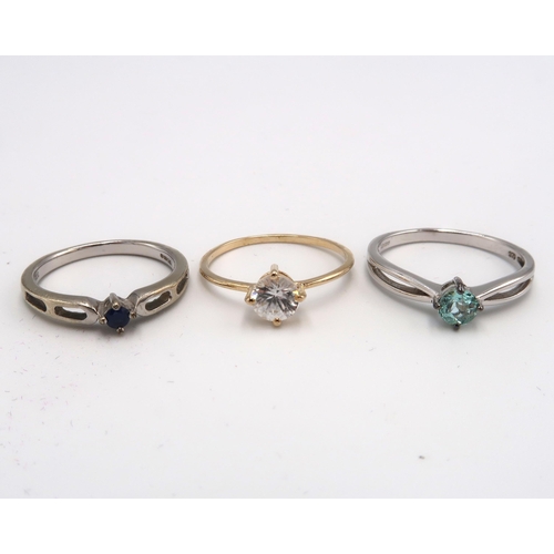 69 - Three 9ct gold single stone rings. To include zircon, size M, Paraiba tourmaline size N 1/2, sapphir... 