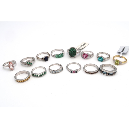 74 - A collection of fourteen silver rings. To include sapphire, aquamarine, emerald, andalusite, topaz, ... 