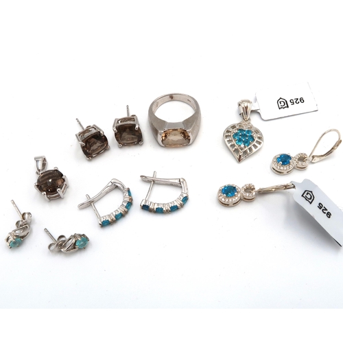 77 - A collection of silver jewellery set with apatite and quartz. To include four pairs of earrings, two... 