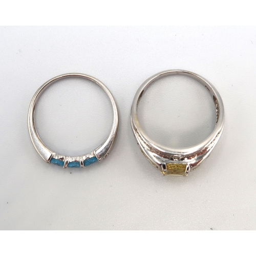 80 - Two 9ct gold rings. To include topaz and diamond, size N 1/2. together with a golden beryl, white sa... 