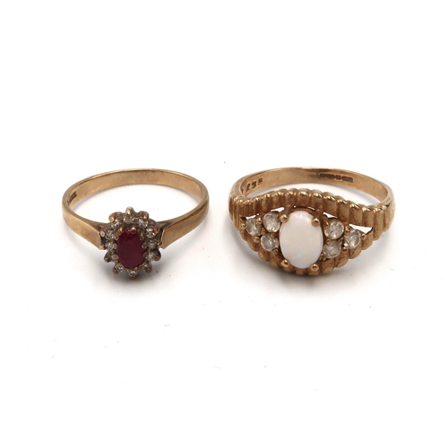 92 - Two 9ct gold dress rings. To include an opal and white stone dress ring size P1/2. Together with a r... 