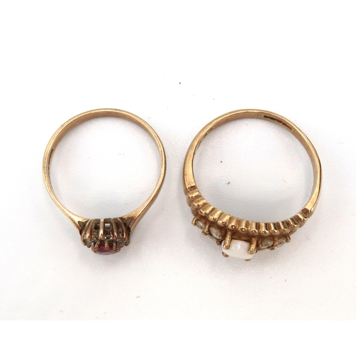 92 - Two 9ct gold dress rings. To include an opal and white stone dress ring size P1/2. Together with a r... 