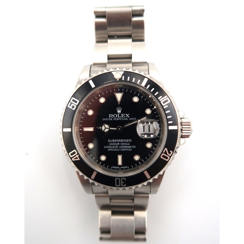 281 - A Rolex Oyster Perpetual 40mm Submariner 16610 serial number V392730 - with box and papers and garan... 