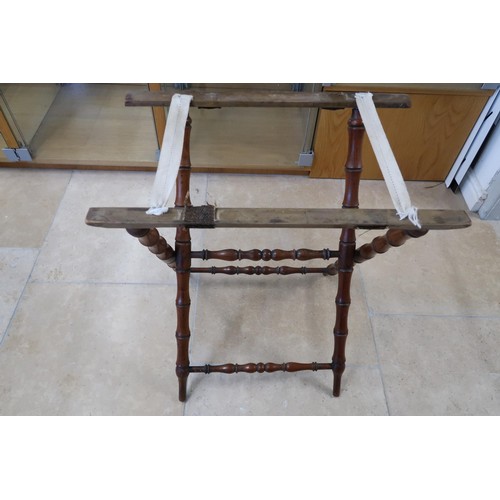 685 - A 19th century mahogany butlers tray and stand