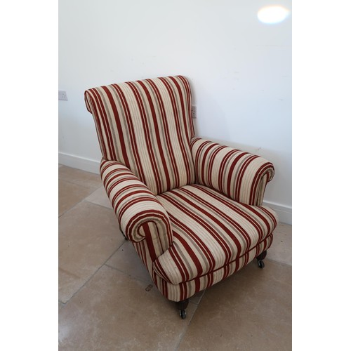 686 - A Victorian style armchair recently re covered and in good condition