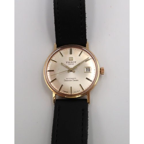 285 - A gent's Tissot 9ct gold Seastar Seven automatic wristwatch having a baton numeral dial on champagne... 