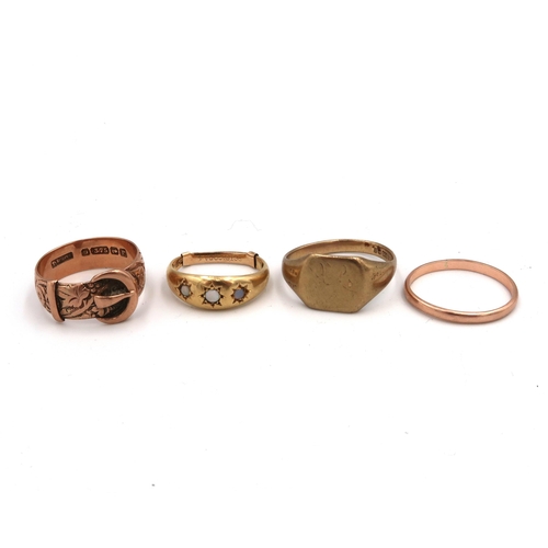 148 - Four 9ct yellow and rose gold rings - one set with trio of opals ring size approx K, one buckle ring... 