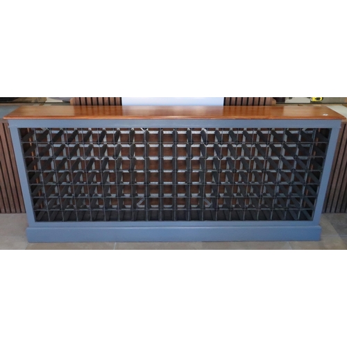 687 - A good quality wine rack holding 140 bottles with a polished top and painted base - Width 203cm x He... 