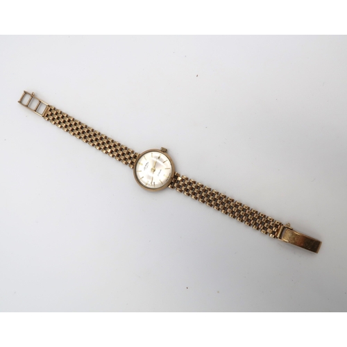 292 - A 9ct gold cased, lady's Rotary cocktail watch with integral 9ct gold gate-link bracelet strap, tota... 