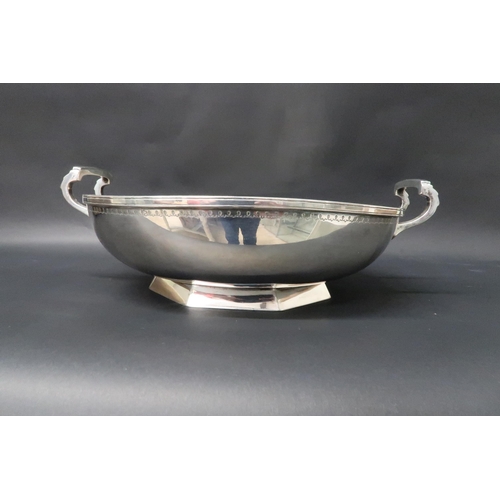 327 - A hallmarked silver twin handled circular bowl on plinth, 23cm diameter x 7cm tall, weight approx 25... 