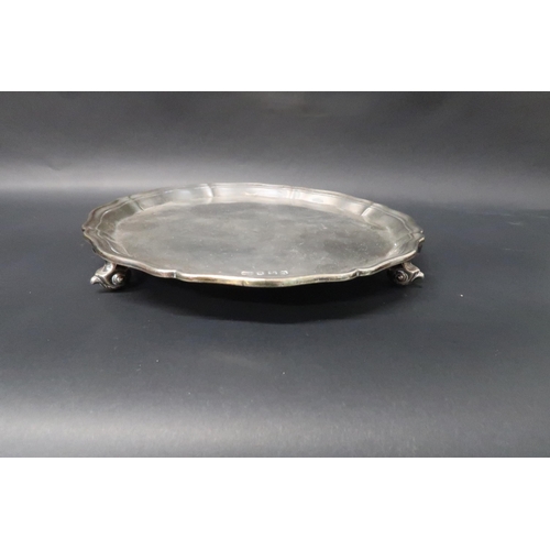 329 - A hallmarked silver circular salver on tripod feet, no engraving, 20cm diameter, weight approx 9.9 t... 