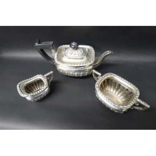 331 - A hallmarked silver teapot with matching jug and sugar bowl, total weight approx 21.5 troy oz