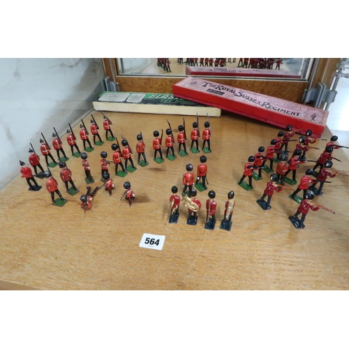 564 - A collection of painted lead British soldiers, the Royal Sussex Regiment, boxed by W.Britain and Bri... 