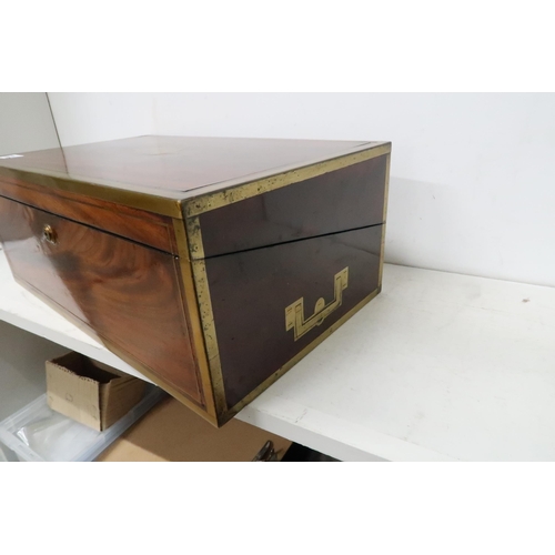 621 - A good quality 19th century mahogany and brass bound fitted box with a J. Bramah lock with a key and... 