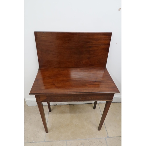 630 - A 19th century mahogany fold over tea table - Width 72cm