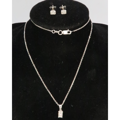 3 - A suite of 18ct white gold and diamond jewellery comprising a pendant necklace and earrings, each se... 