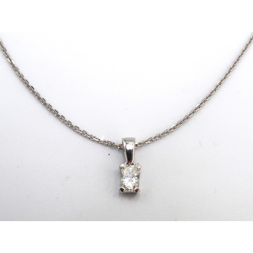 3 - A suite of 18ct white gold and diamond jewellery comprising a pendant necklace and earrings, each se... 