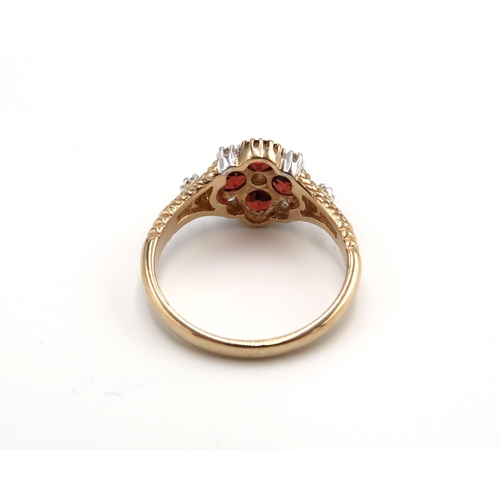 51 - A 9ct yellow gold citrine and diamond ring, citrine and diamonds are a good colour and well matched,... 