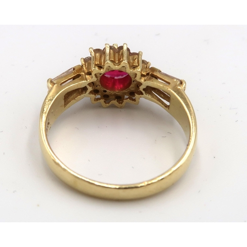  A ruby (possibly synthetic) and brilliant cut diamond cluster ring with tapered baguette diamonds to... 