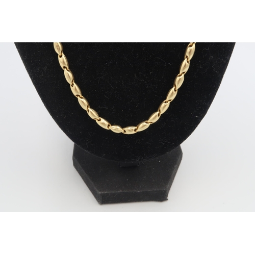 22 - A Chimento fancy-link necklace. Stamped 750. Weight 13.96 grams, chain length 46cm.