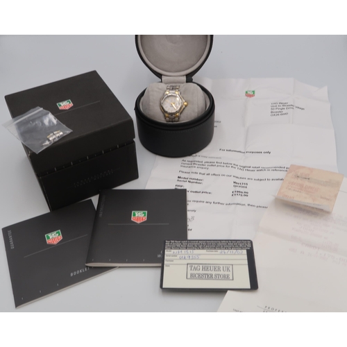 252 - A ladies Tag Heuer quartz wristwatch with receipt for £1175 in 2002 - with box and papers, new batte... 