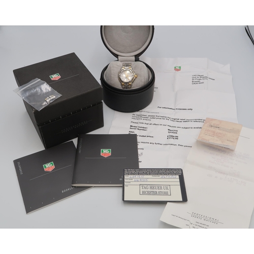 252 - A ladies Tag Heuer quartz wristwatch with receipt for £1175 in 2002 - with box and papers, new batte... 