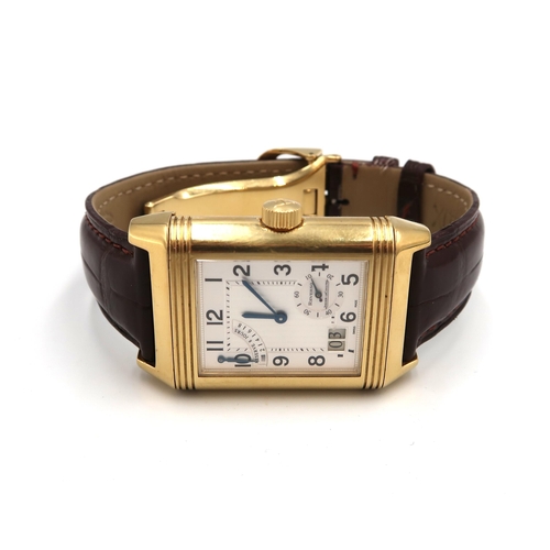 253 - A Jaeger-LeCoultre Reverso XGT Grande Date 18ct gold wristwatch serial number 2168764 with three ser... 