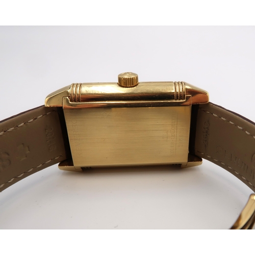 253 - A Jaeger-LeCoultre Reverso XGT Grande Date 18ct gold wristwatch serial number 2168764 with three ser... 