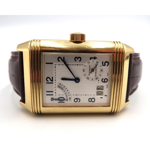 253 - A Jaeger-LeCoultre Reverso XGT Grande Date 18ct gold wristwatch serial number 2168764 with three ser... 