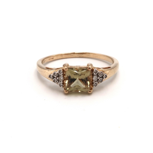 31 - A 9ct Yellow Gold Square Cut Citrine ring with 6 Diamonds to each Shoulder, Ring Size Approx. T/U, H... 